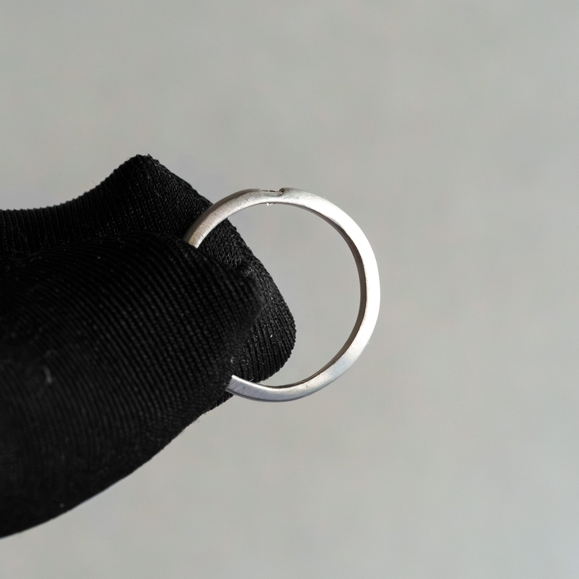 14kt White Gold Matte Tension-Set Princess Cut Diamond Band (.10ctw)