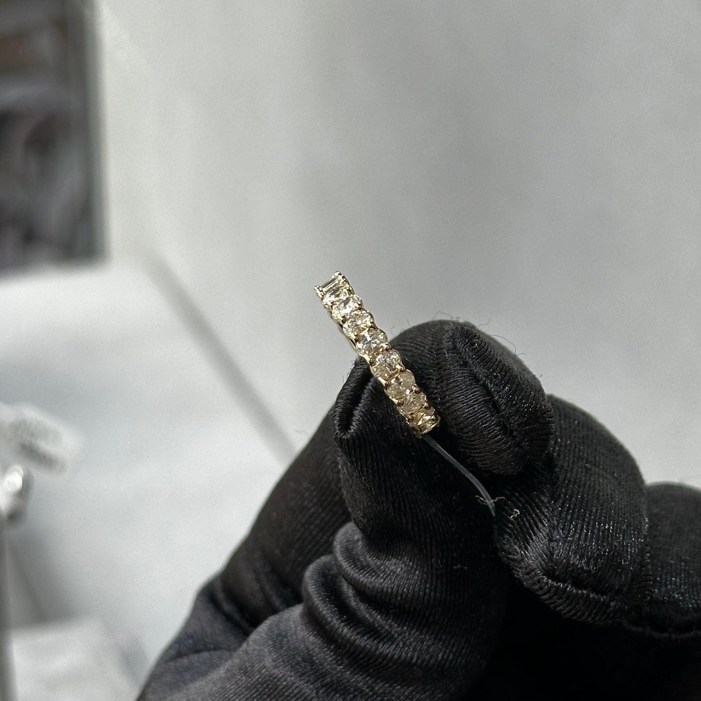 Yellow Gold Emerald and Oval Diamond Eternity Band