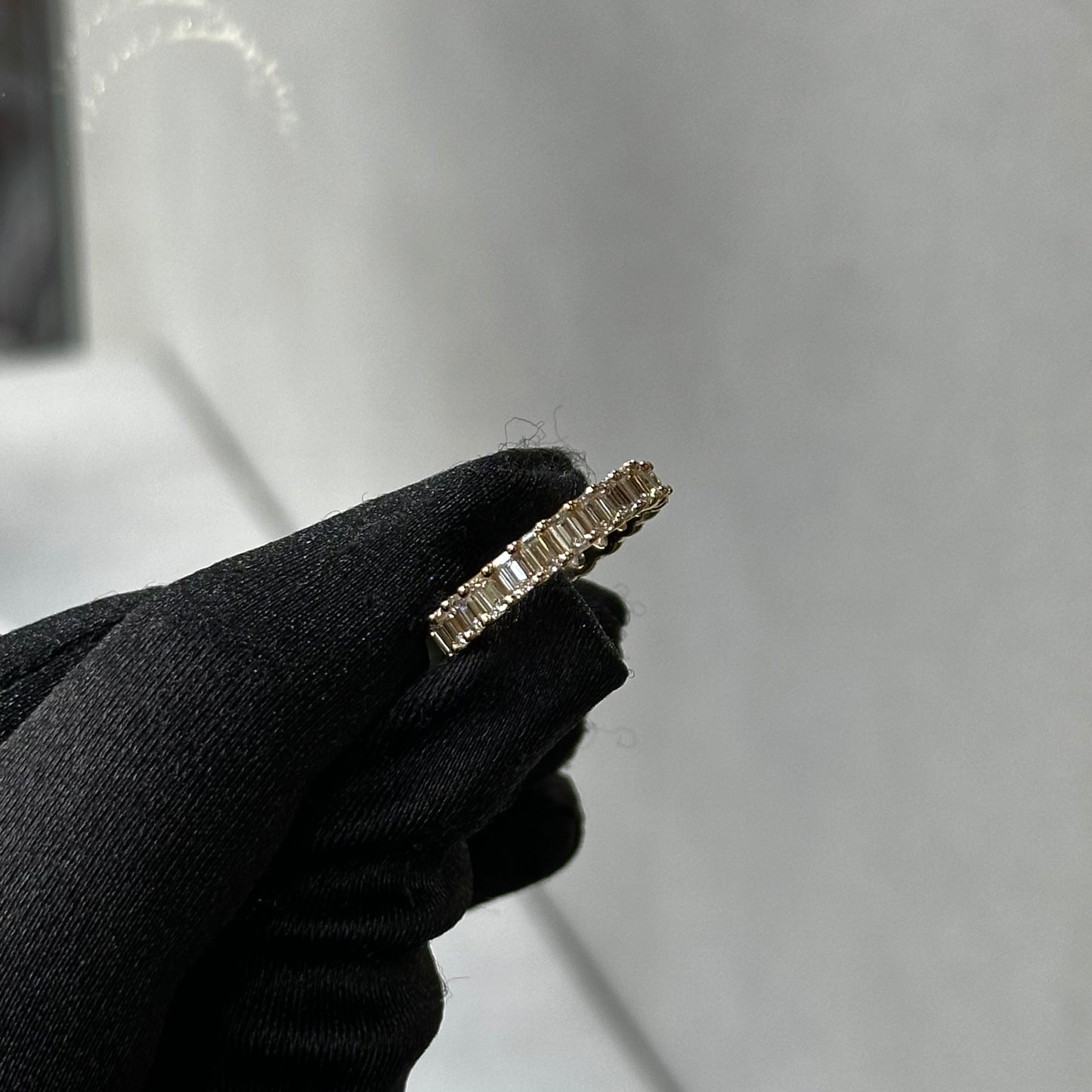 Yellow Gold Emerald and Oval Diamond Eternity Band