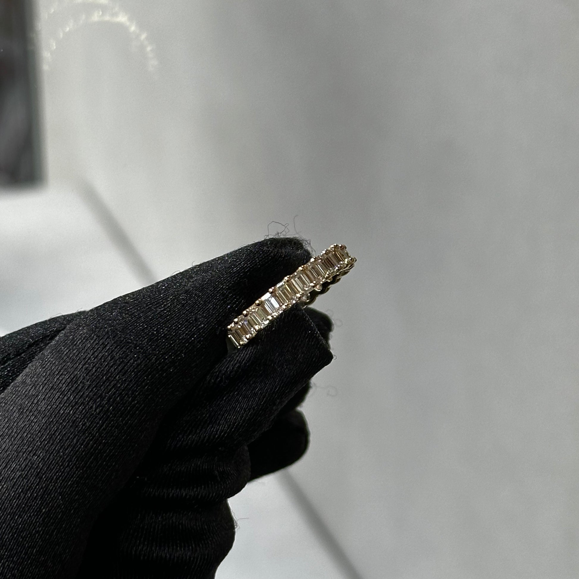 Yellow Gold Emerald and Oval Diamond Eternity Band