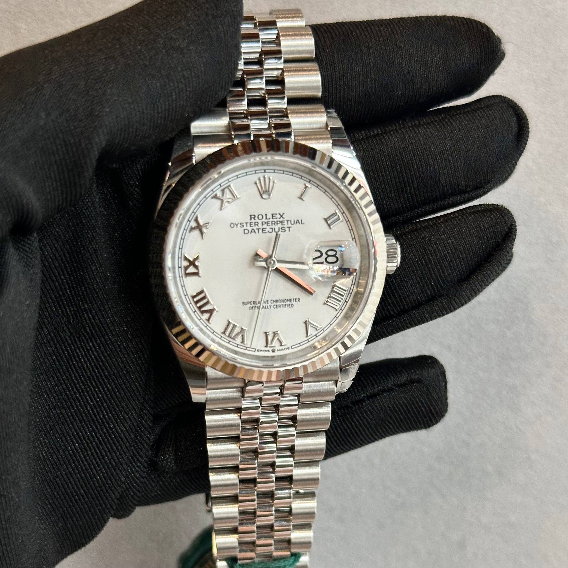 2024 Rolex Datejust 36mm – Fluted Bezel, White Roman Dial, Jubilee Bracelet – Model 126234
